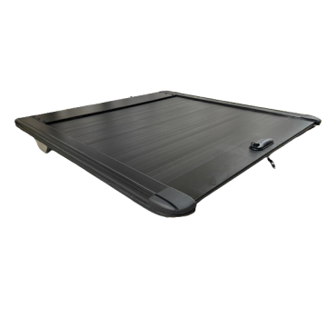 Tapa retractil manual